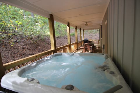 Back porch with hot tub.