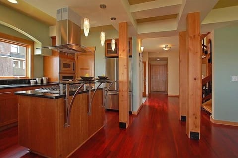 View from Living Room to Kitchen and Entry beyond.