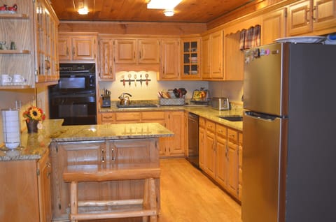 Gas stovetop, wall oven, microwave, mini wine refrigerator, and sooooo much more