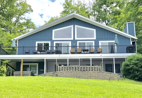 Lake Front view of the house.  New (2019) Hot Tub on lower left.