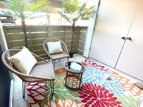 Patio with Washer/Dryer Behind Double Doors