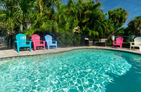 Heated Pool with Sun Ledge and Tiki Bar