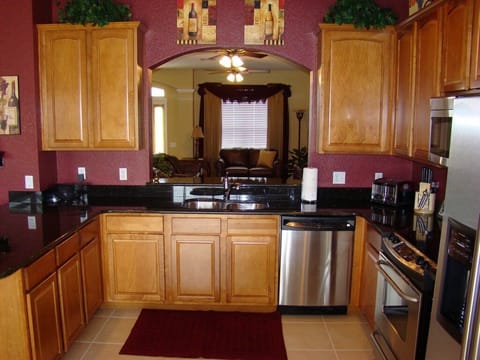 Kitchen opening to Family Room