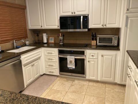 Kitchen with new appliances and Ninja coffee maker (K-cups).