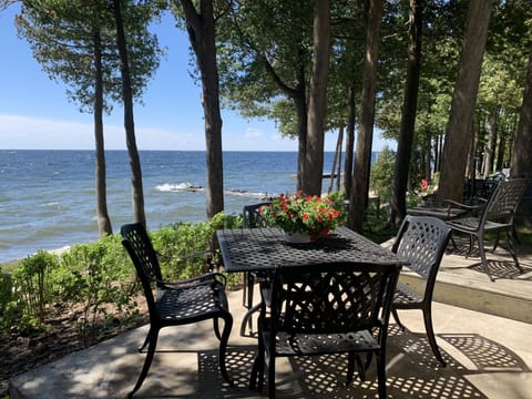 Waterfront Front deck with table and 4 chairs, 2 chairs with side table 