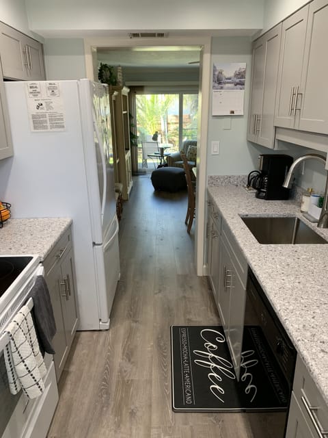 Kitchen looking out to living room 