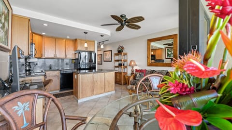 Looking from dining area to kitchen and living area.