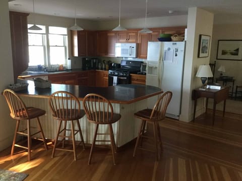 Kitchen area with room for overflow seating at the bar