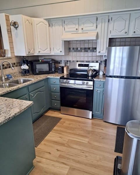 Updated kitchen stocked with all cooking essentials