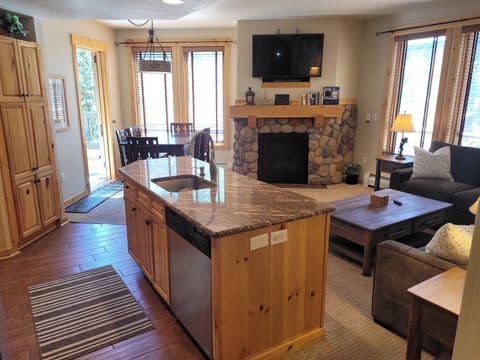 Kitchen and Living/Dining area looking towards the deck door