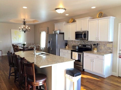 Large well stocked galley kitchen to prepare meals while enjoying the view.