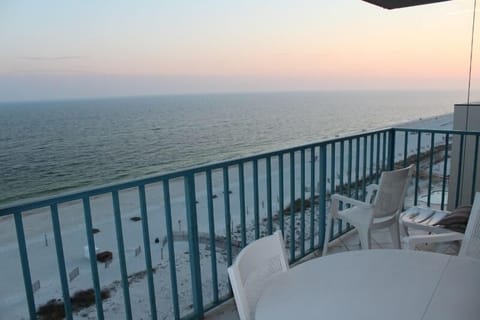Beautiful sunset on the beachfront corner balcony