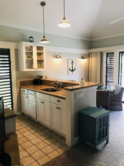 Updated kitchen with granite countertops and a dishwasher