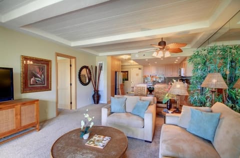 Living room, dining area and kitchen from lanai.