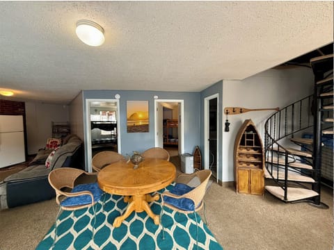 Downstairs entry showing bedrooms, bathroom and stairs