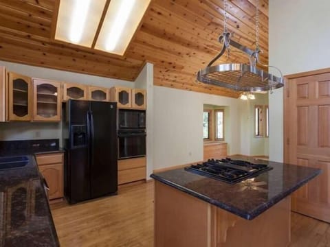 Kitchen and view into dining room.