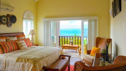 The main bedroom has a king-size bed and great views of Shoal Bay.