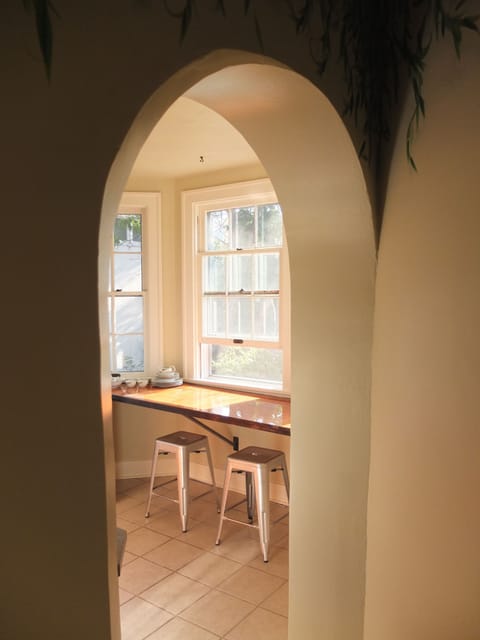 Into the kitchen with bar style dining area (fits 2/3 people).