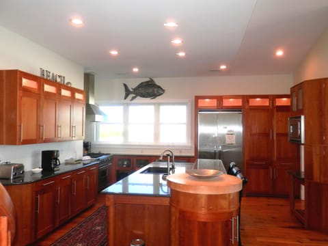 Upstairs kitchen. Fully Stocked with everything you need. Stainless Appliances!
