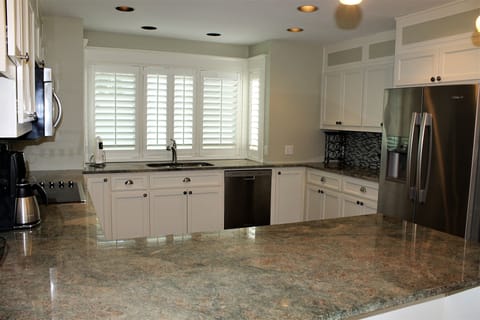 Granite countertops, stainless appliances & lots of space for cooking