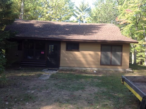 Road side entrance. Small screen porch.