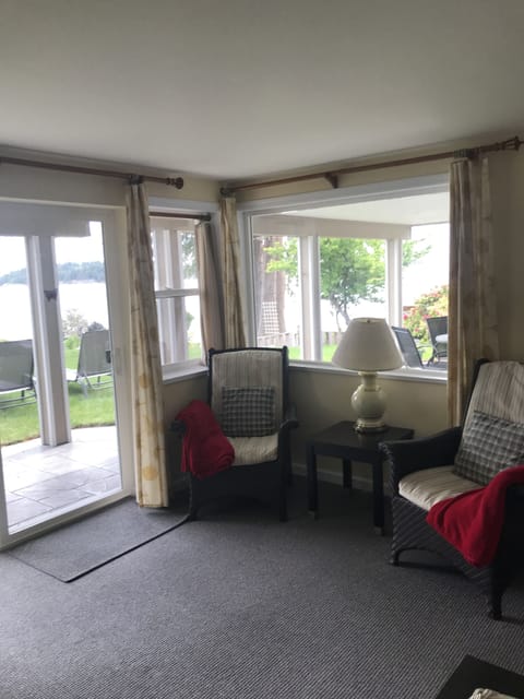 living room with covered
patio outside
