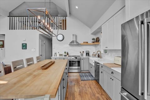 Island seating for up to 8 people, we also have a high chair and booster seat. 