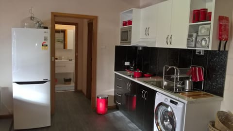 Well equipped kitchen +wash machine