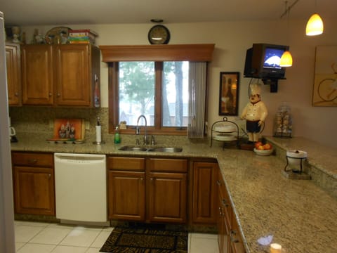 Beautiful granite countertops and laundry room in half bath on main level.....