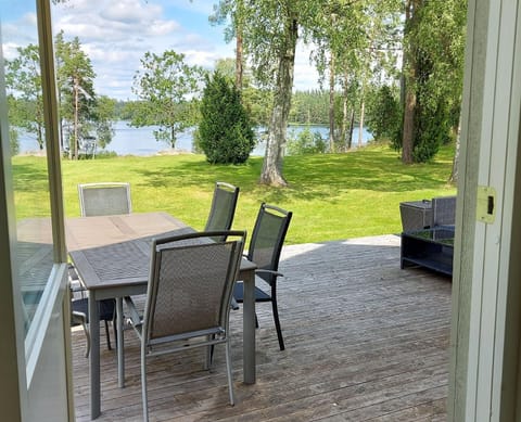 View over the patio, park area and beach of North Annex