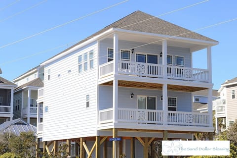 Outside street view. Bright, sunny end-of-row location. Great for ocean views!