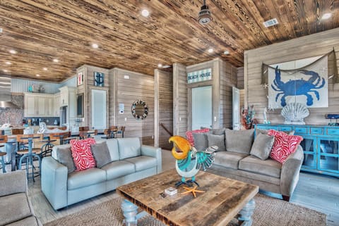 Spacious lounge w/ sectional sofas and warm textures designed for group relaxation