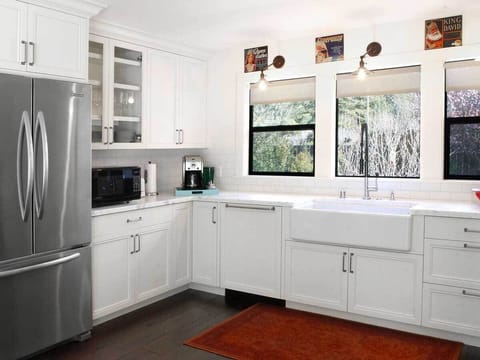 Chef's kitchen w/Carrera Marble countertops &  filtered drinking water. 