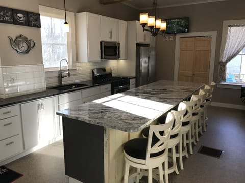 Beautiful kitchen with 5 burner gas stove.