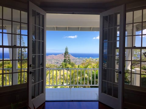 Living room opens up to the lanai (porch)