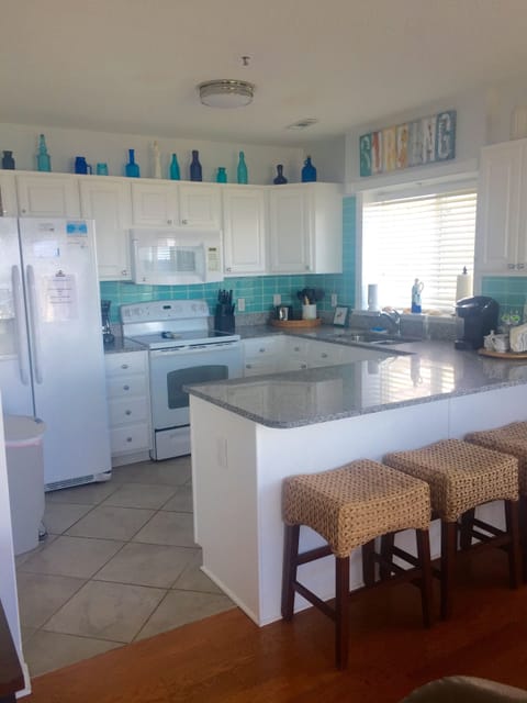 Kitchen with extra bar seating.