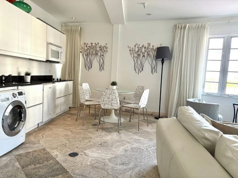 Open concept living area, dining and kitchen