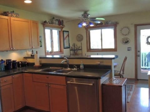 KITCHEN LOOKING INTO DINING AREA