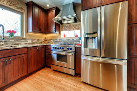 Gourmet Kitchen. Includes Blue Star 6 gas burner cook top and range