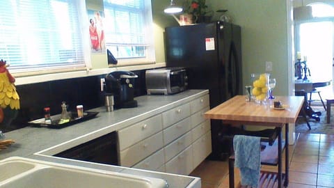 kitchen -including butcher block island that’s so functional