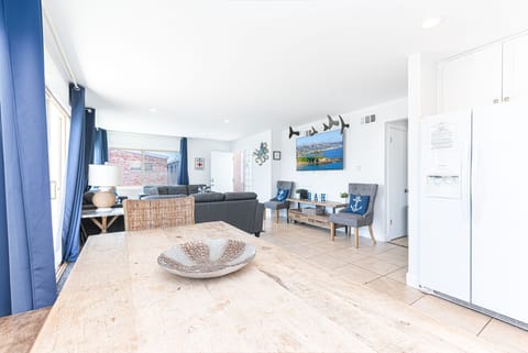 The dining table includes seating for 6.