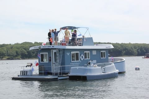 Waterbug-E along side the Nancy Lou, included in the rental.