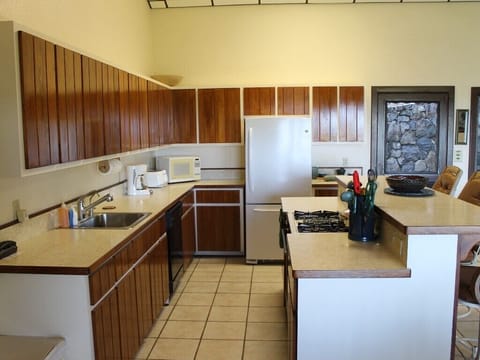 This is the main kitchen and is well-equipped for full meals and entertaining.