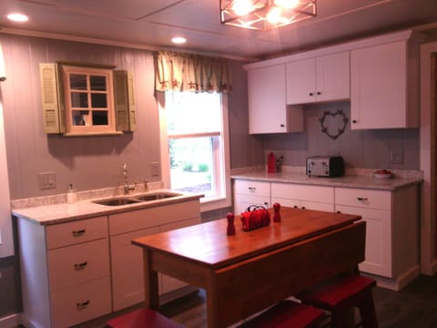 Ample cupboards and prep space.  Lots of natural lighting!