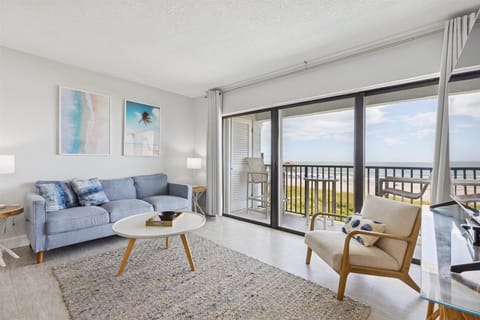 Cozy oceanfront living room with breathtaking views and natural light.