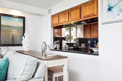 Fully equipped kitchens include modern appliances, granite countertops, and everything needed to prepare meals during your stay.