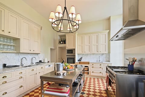 The kitchen is equipped to serve large groups or intimate gatherings.