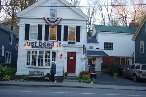 Brewery on the right, dispensary  on the left. Stoned Local pedestrian walking 