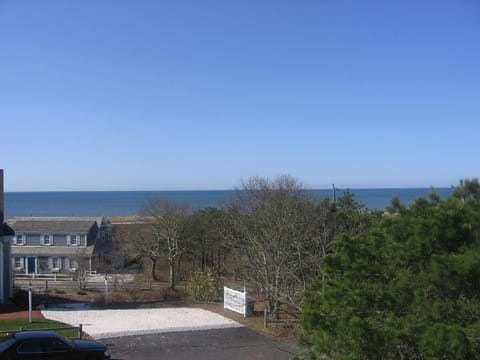 Enjoy sea views of Nantucket Sound from large, furnished upper deck.