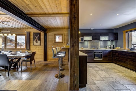 Bar stools and spacious kitchen
